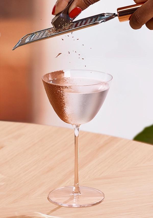Ketel One Chocolate Martini in Coupe Glass with hand grating chocolate 