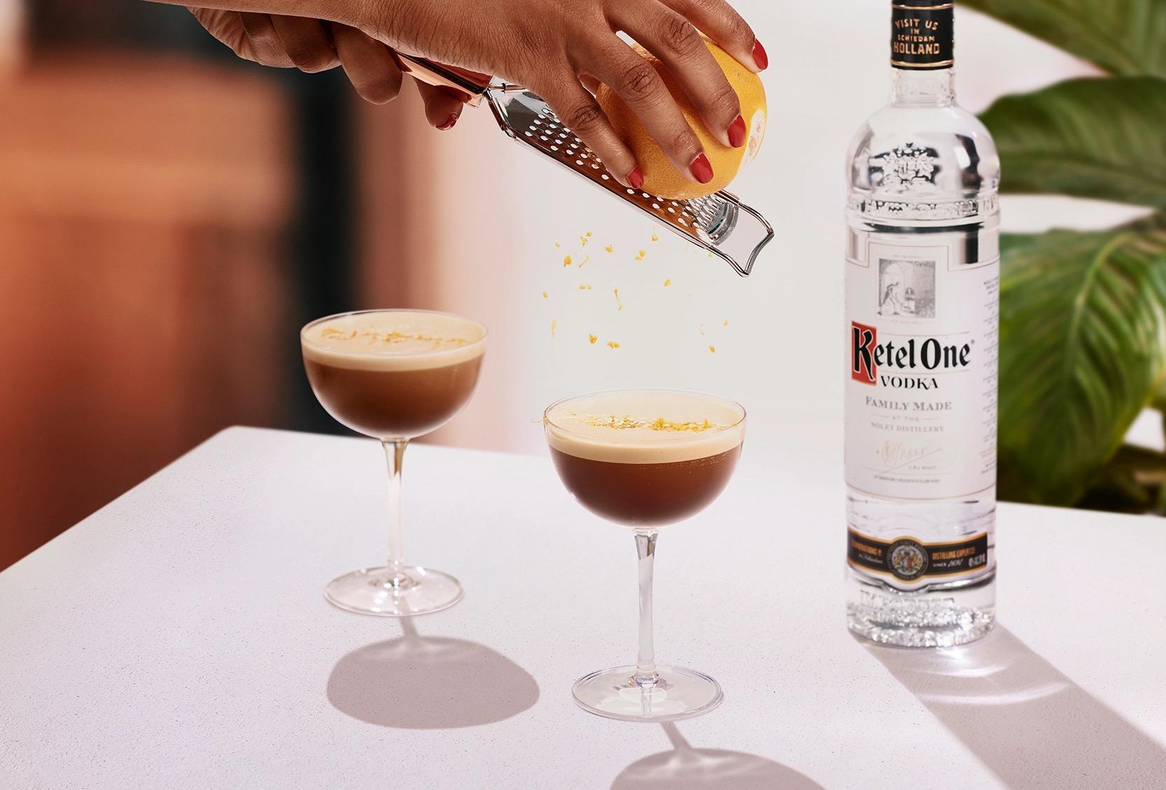 Ketel One Espresso Martini in Coupe Glass with hand grating orange 